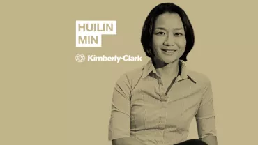 Person in a collared shirt with a beige background, text reads 'Huilin Min Kimberly-Clark'.