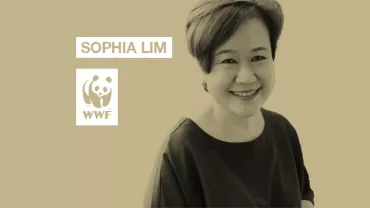 Woman smiling with text 'Sophia Lim' and WWF logo on light brown background.