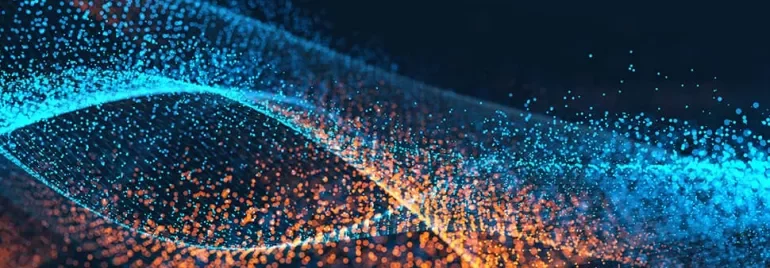 Abstract image with swirling blue and orange particles against a dark background.