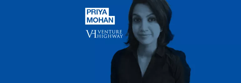 Portrait of a person with dark hair on a blue background with 'Priya Mohan, Venture Highway' written.